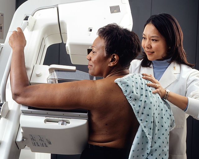 Woman receives mammogram