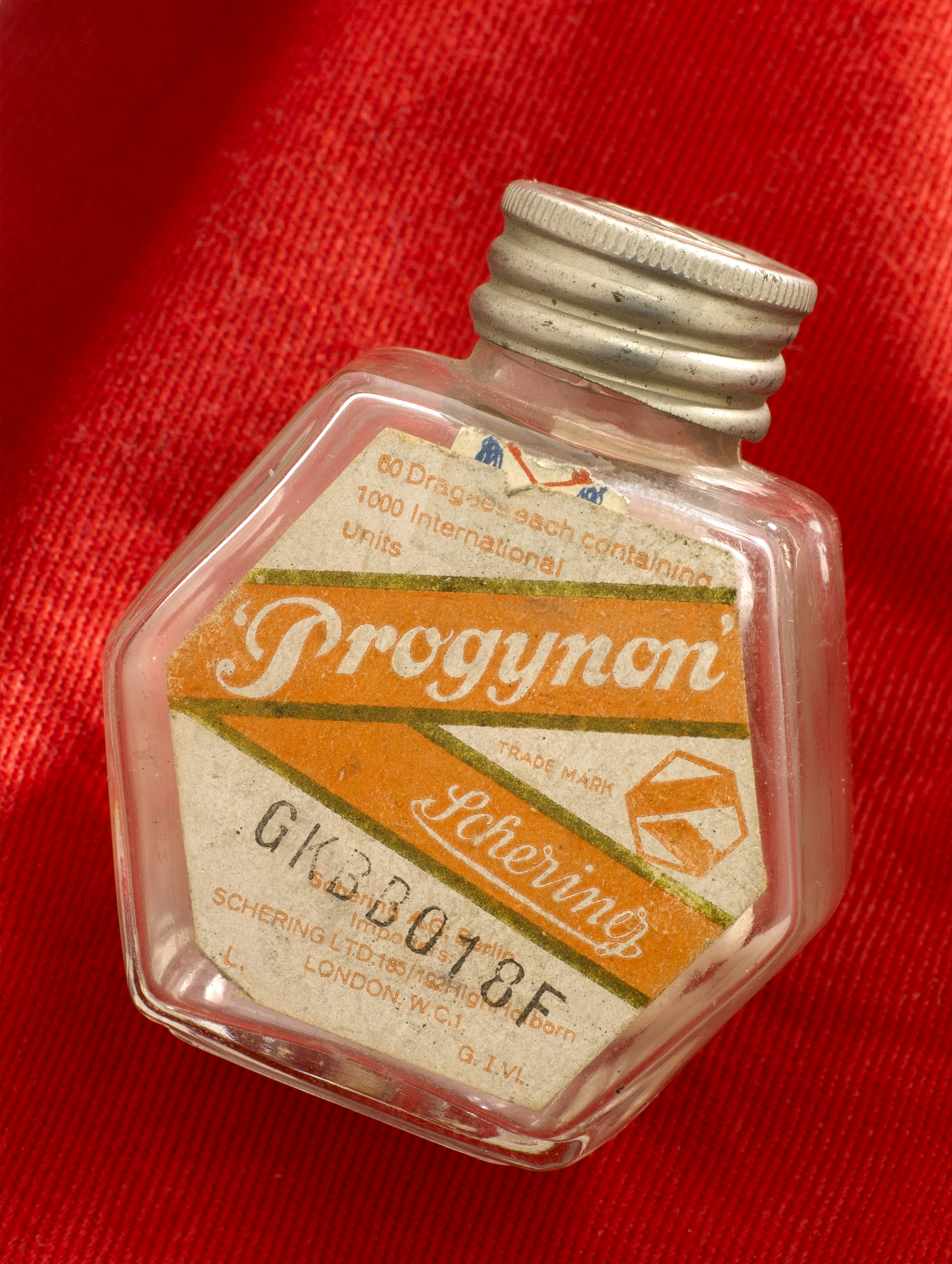 Glass bottle for 'Progynon' pills