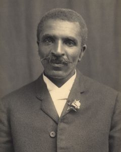 Cabeza en blanco y negro sobre retrato de George Washington Carver circa 1910