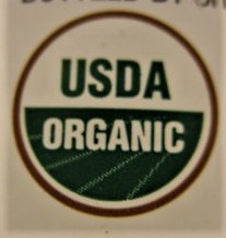 The USDA Organic logo (a green farm icon surrounded by a brown circle)
