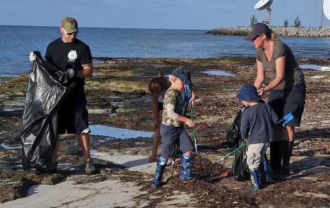 U.S._Sailors_and_members_of_their_families_help_clean_up_litter_at_Truman_Annex_at_Naval_Air_Station_Key_West,_Fla.,_Sept_130921-N-YB753-022.jpg