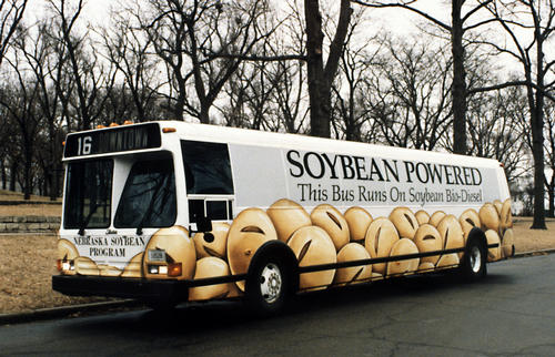 The front of the bus says: "Nebraska Soybean Program" and the bus marquee says "Downtown".