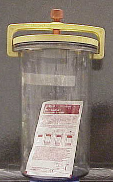 sealed anaerobic jar with gas pack inside that removes oxygen from the internal atmosphere of the jar