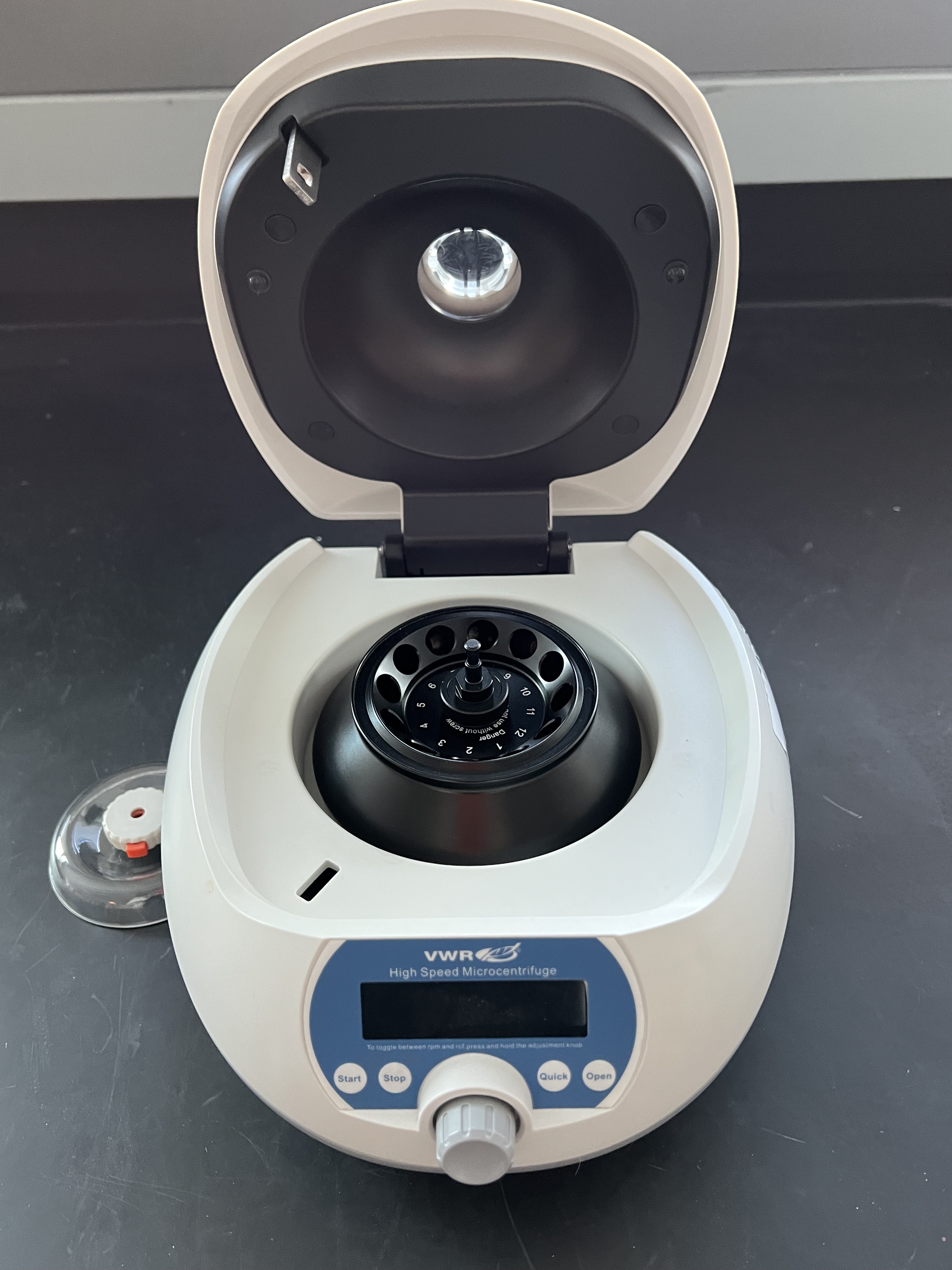 a microcentrifuge with its lid open